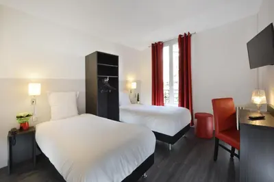 Un ou plusieurs lits dans un hébergement de l'établissement Hotel Douglas
