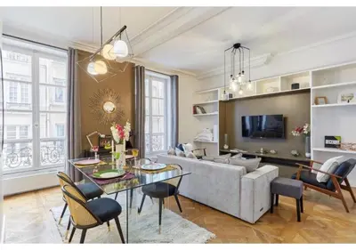 Télévision ou salle de divertissement dans l'établissement Apartment Le Marais by Studio prestige