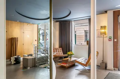 Coin salon dans l'établissement Le 20 Prieuré Hôtel
