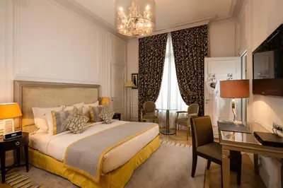 Un ou plusieurs lits dans un hébergement de l'établissement Majestic Hotel Spa - Champs Elysées