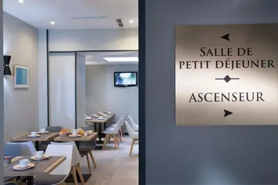 Télévision ou salle de divertissement dans l'établissement Hôtel Moulin Vert