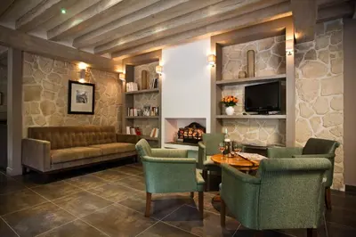 Coin salon dans l'établissement Hôtel Du Printemps