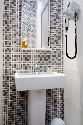 Salle de bains dans l'établissement Hôtel Du Printemps