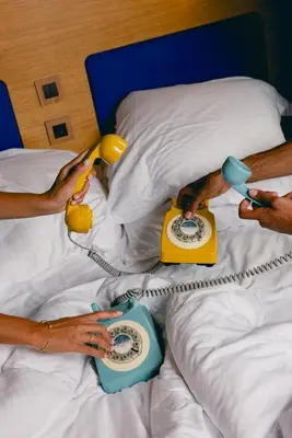 Un ou plusieurs lits dans un hébergement de l'établissement Hôtel Odyssey