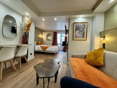 Un ou plusieurs lits dans un hébergement de l'établissement Hotel Nation Montmartre
