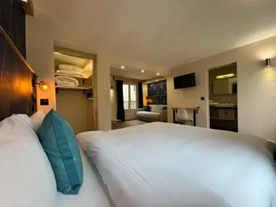 Un ou plusieurs lits dans un hébergement de l'établissement Hotel Nation Montmartre