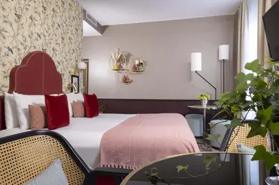Un ou plusieurs lits dans un hébergement de l'établissement Welcome Hotel