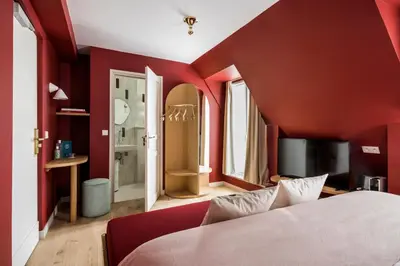 Un ou plusieurs lits dans un hébergement de l'établissement Hôtel AMI - Orso Hotels