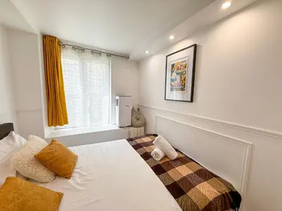Un ou plusieurs lits dans un hébergement de l'établissement UrbanFlat 41 - Disneyland in Paris - Montorgueil
