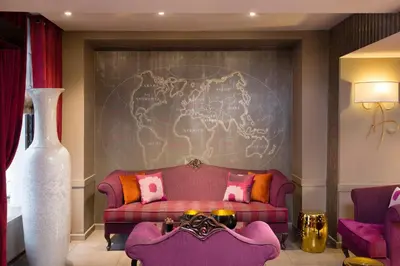 Coin salon dans l'établissement Hôtel Mondial