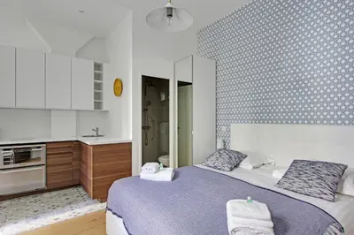Un ou plusieurs lits dans un hébergement de l'établissement Pick a Flat's Apartment in Montmartre - Rue des Martyrs studio