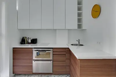 Cuisine ou kitchenette dans l'établissement Pick a Flat's Apartment in Montmartre - Rue des Martyrs studio