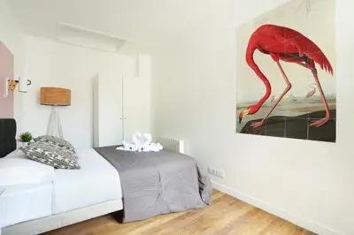 Un ou plusieurs lits dans un hébergement de l'établissement Rent a Room - Residence Meslay