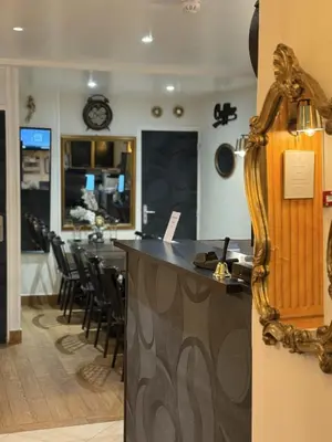 Restaurant ou autre lieu de restauration dans l'établissement Victory Hotel Galou