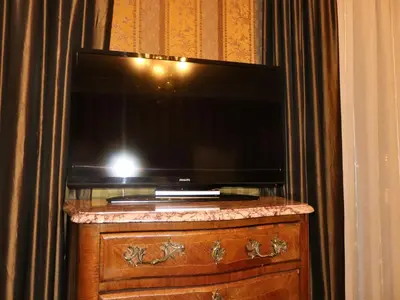 Télévision ou salle de divertissement dans l'établissement Hotel Windsor Home