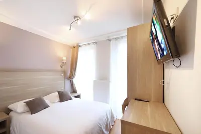 Télévision ou salle de divertissement dans l'établissement Luxelthe