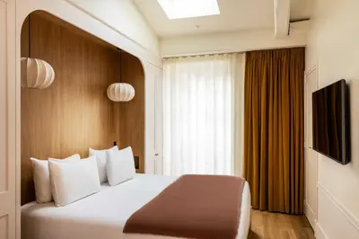 Télévision ou salle de divertissement dans l'établissement Hôtel Casimir