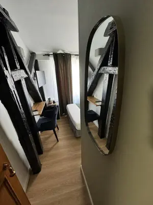 Un ou plusieurs lits dans un hébergement de l'établissement Hôtel Flor Rivoli