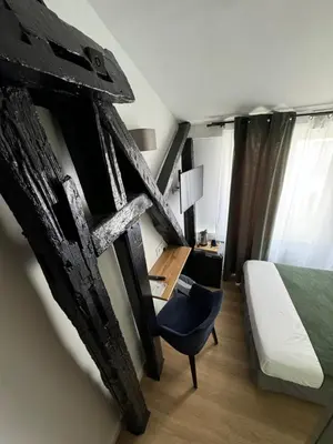 Un ou plusieurs lits dans un hébergement de l'établissement Hôtel Flor Rivoli