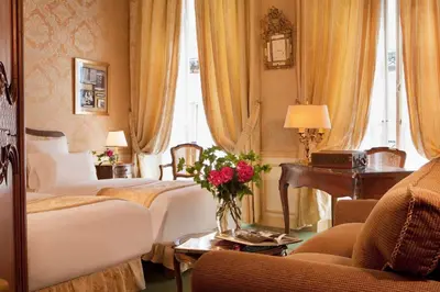 Un ou plusieurs lits dans un hébergement de l'établissement Hotel d'Angleterre