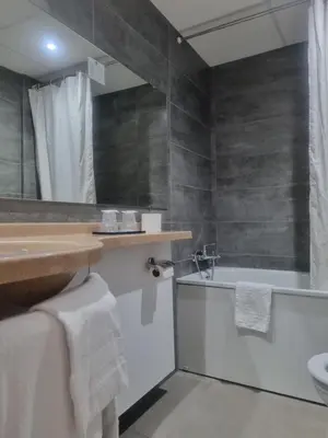 Salle de bains dans l'établissement Hôtel Eiffel Kensington