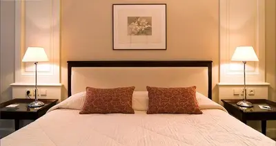 Un ou plusieurs lits dans un hébergement de l'établissement Hôtel Bedford