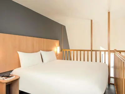 Un ou plusieurs lits dans un hébergement de l'établissement ibis Paris Bastille Faubourg St Antoine
