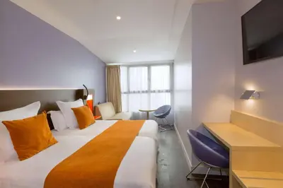 Un ou plusieurs lits dans un hébergement de l'établissement Best Western Seine West Hotel