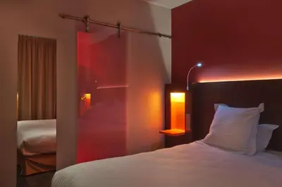 Un ou plusieurs lits dans un hébergement de l'établissement Best Western Seine West Hotel