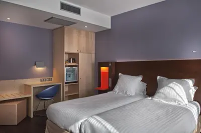 Un ou plusieurs lits dans un hébergement de l'établissement Best Western Seine West Hotel