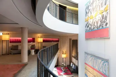 Un ou plusieurs lits dans un hébergement de l'établissement Hotel Square