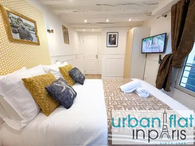 Un ou plusieurs lits dans un hébergement de l'établissement Urban Flat 42 - LUXURY FLAT