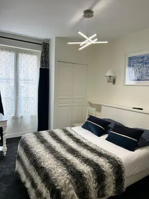 Un ou plusieurs lits dans un hébergement de l'établissement Hotel du Dragon