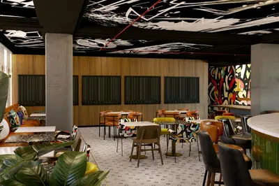 Restaurant ou autre lieu de restauration dans l'établissement Moxy Paris La Villette