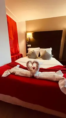 Un ou plusieurs lits dans un hébergement de l'établissement Jeff Hotel
