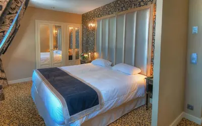 Un ou plusieurs lits dans un hébergement de l'établissement Hotel de L'Empereur by Malone