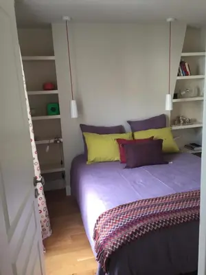 Un ou plusieurs lits dans un hébergement de l'établissement Appartement Saint-Dominique 7 eme