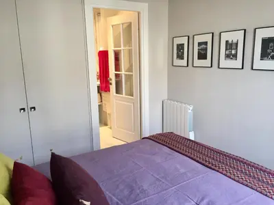 Un ou plusieurs lits dans un hébergement de l'établissement Appartement Saint-Dominique 7 eme