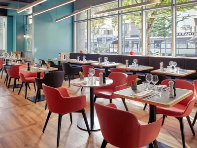 Restaurant ou autre lieu de restauration dans l'établissement Mercure Paris Saint-Ouen