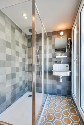 Salle de bains dans l'établissement WIT Hotel