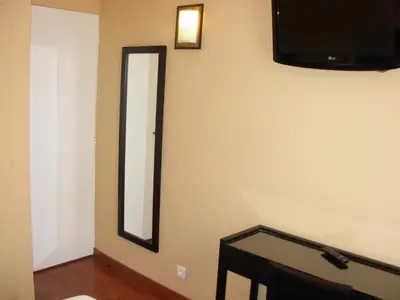 Télévision ou salle de divertissement dans l'établissement Cosmotel Hotel