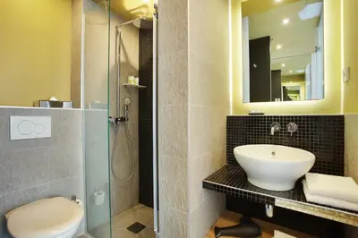 Salle de bains dans l'établissement Hotel Auguste