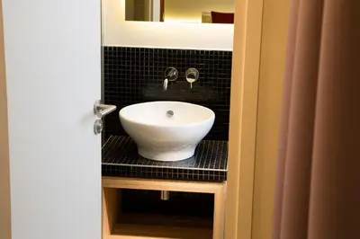 Salle de bains dans l'établissement Hotel Auguste
