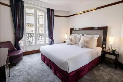 Un ou plusieurs lits dans un hébergement de l'établissement Hôtel Pont Royal Paris