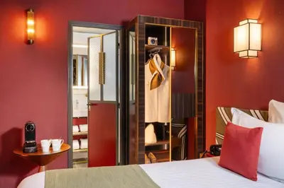 Un ou plusieurs lits dans un hébergement de l'établissement Hôtel Aoriste & Spa