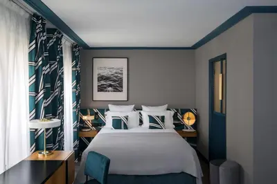 Un ou plusieurs lits dans un hébergement de l'établissement Hôtel Aoriste & Spa