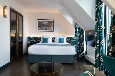 Un ou plusieurs lits dans un hébergement de l'établissement Hôtel Aoriste & Spa