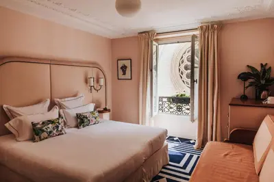 Un ou plusieurs lits dans un hébergement de l'établissement Hôtel Bienvenue