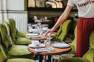 Coin salon dans l'établissement Hôtel Bienvenue