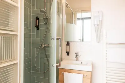Salle de bains dans l'établissement Hotel Terre Neuve